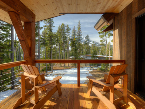 View of mountain from deck framed by timber posts